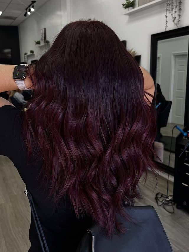4. Deep Wine Burgundy Balayage with Loose Waves - Burgundy Balayage Hair Color