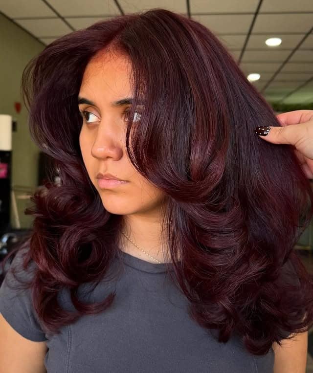 11. Deep Burgundy Balayage with Voluminous Butterfly Layers - Burgundy Balayage Hair Color
