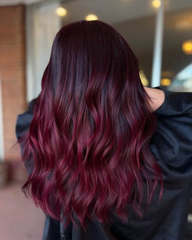 16. Vibrant Cherry Burgundy Balayage with Loose Waves - Burgundy Balayage Hair Color
