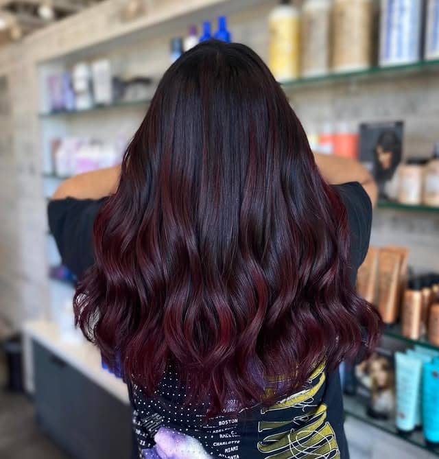 19. Dark Cherry Burgundy Balayage with Glossy Waves - Burgundy Balayage Hair Color