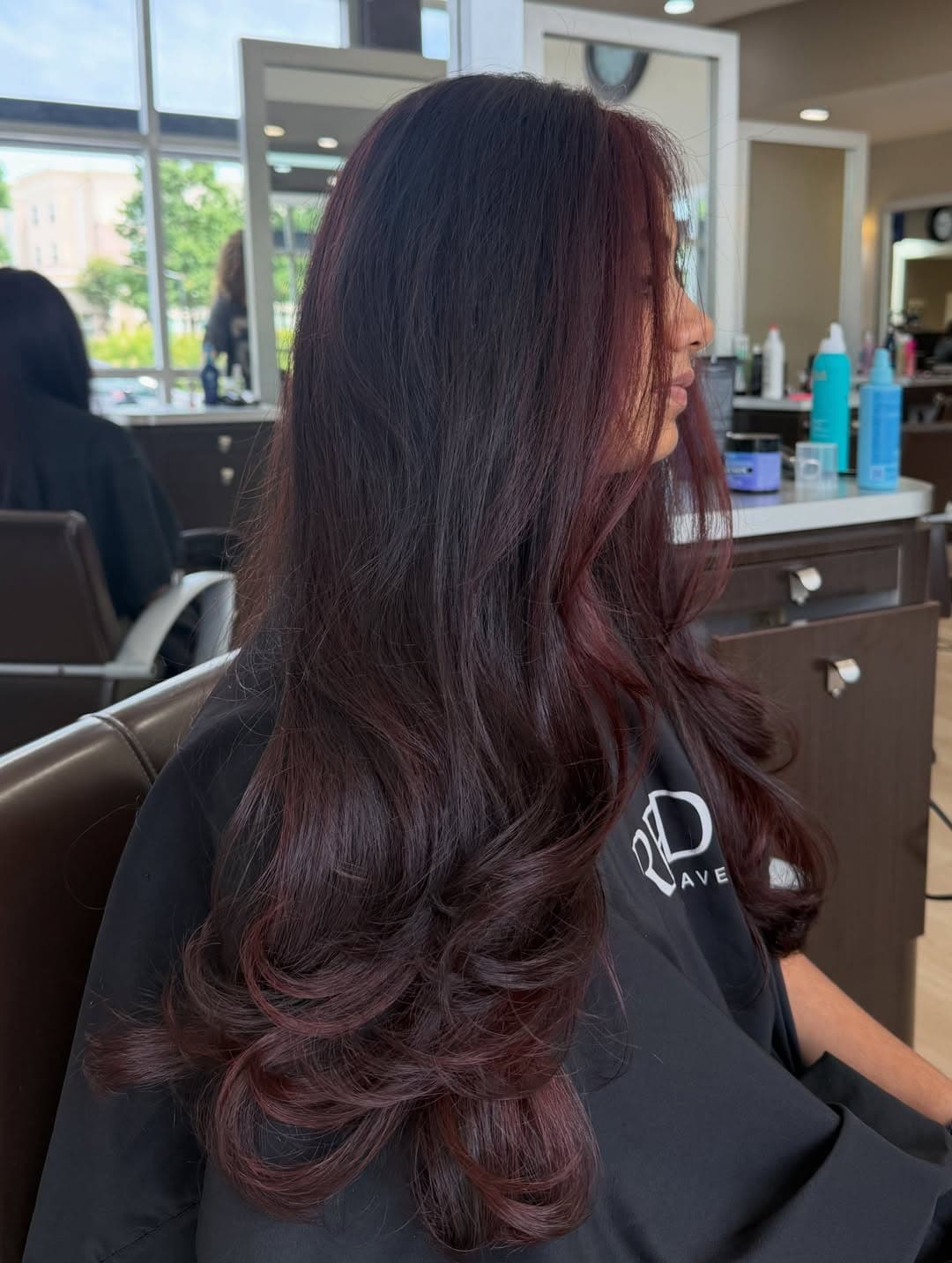 21. Dark Burgundy Balayage with Long Feathered Layers - Burgundy Balayage Hair Color