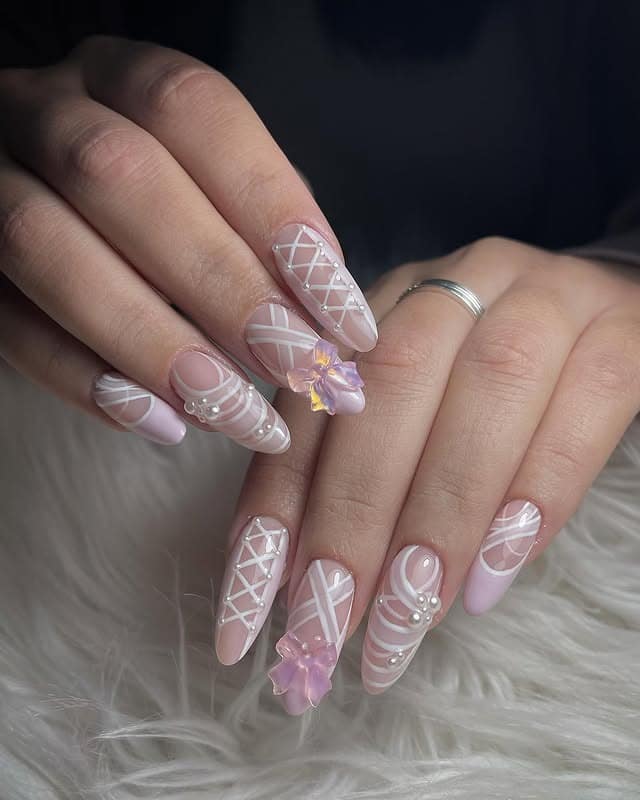 10. Pastel Pink Ballerina Nails with 3D Flowers and Pearls - ballerina nail ideas