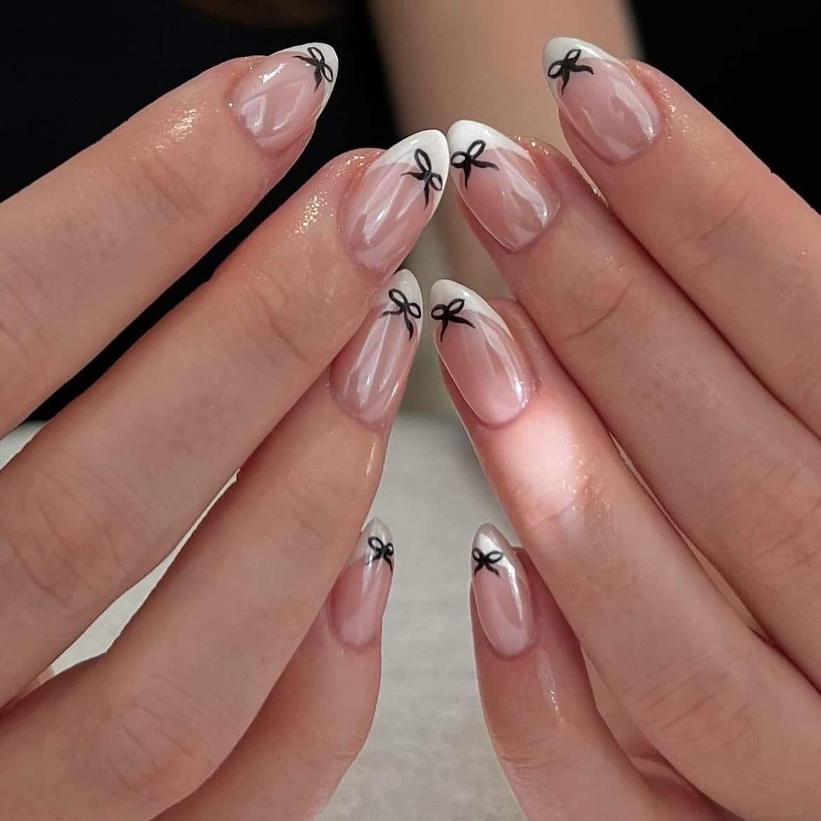 12. Sheer Pink French Ballerina Nails with Black Bows - ballerina nail ideas