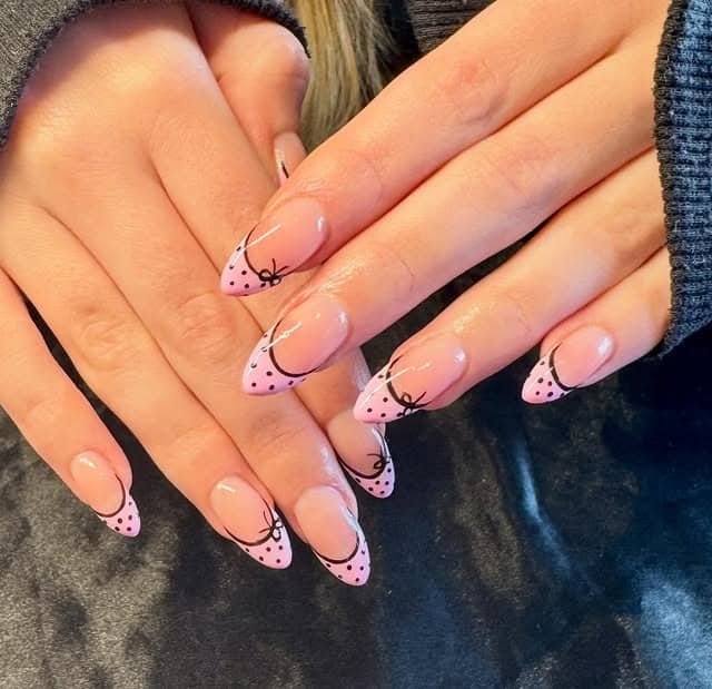 3. Light Pink and Black Bow French Tip Nails - black and pink nail ideas