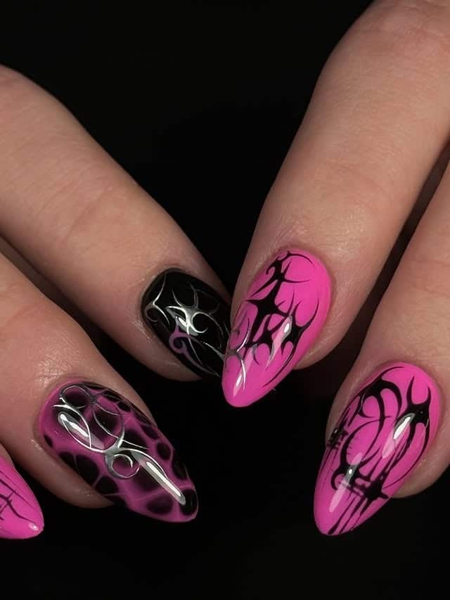 7. Bright Pink and Black Tribal Almond Nails - black and pink nail ideas
