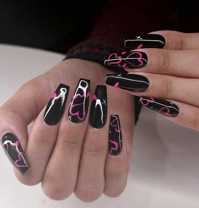 8. Glossy Black Nails with Pink Abstract Hearts - black and pink nail ideas