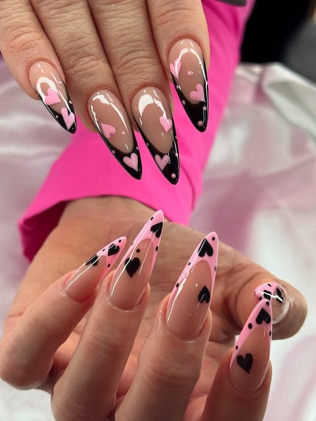 11. Pink and Black Heart Stiletto Nails - black and pink nail ideas