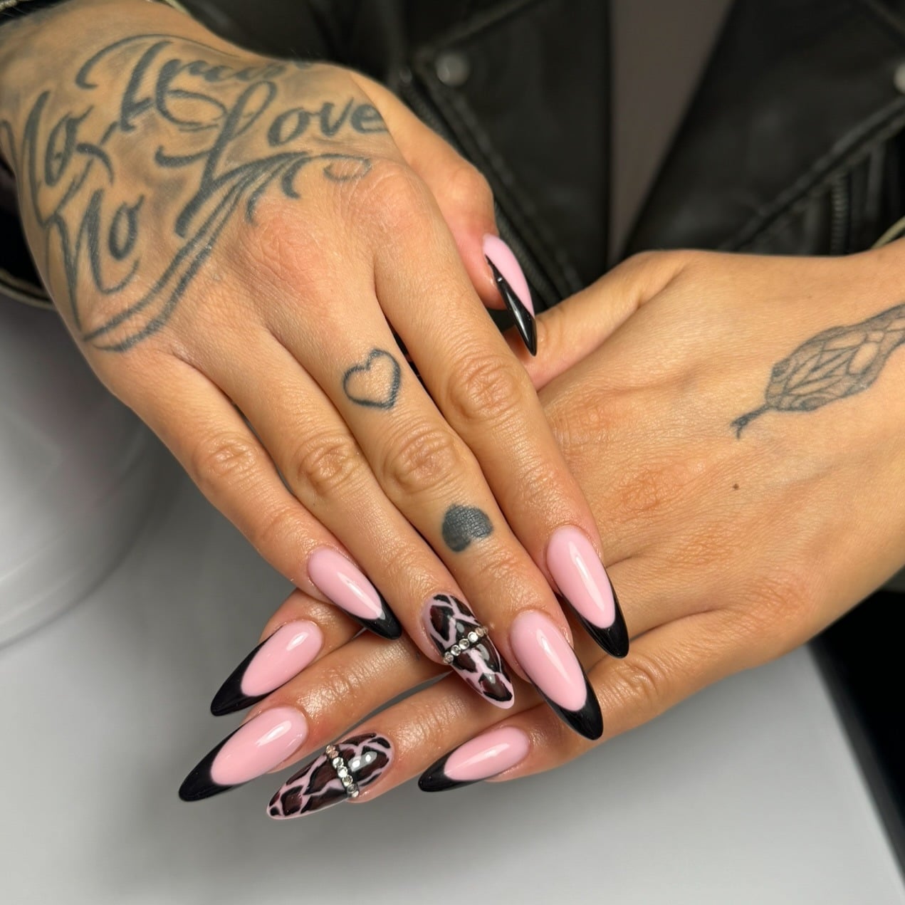 14. Baby Pink and Black Animal Print Stiletto Nails - black and pink nail ideas