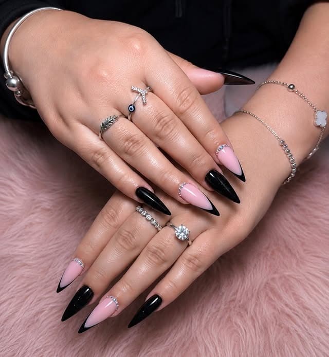 17. Glossy Black and Baby Pink French Stiletto Nails - black and pink nail ideas