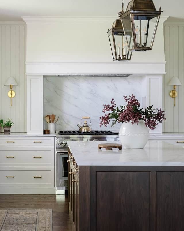 3. Dark Walnut Kitchen Island with Creamy White Cabinets - kitchen color ideas with white cabinets