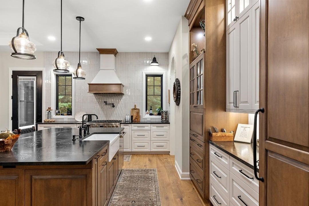 7. Medium Brown Wood Kitchen with White Cabinets and Black Accents - kitchen color ideas with white cabinets