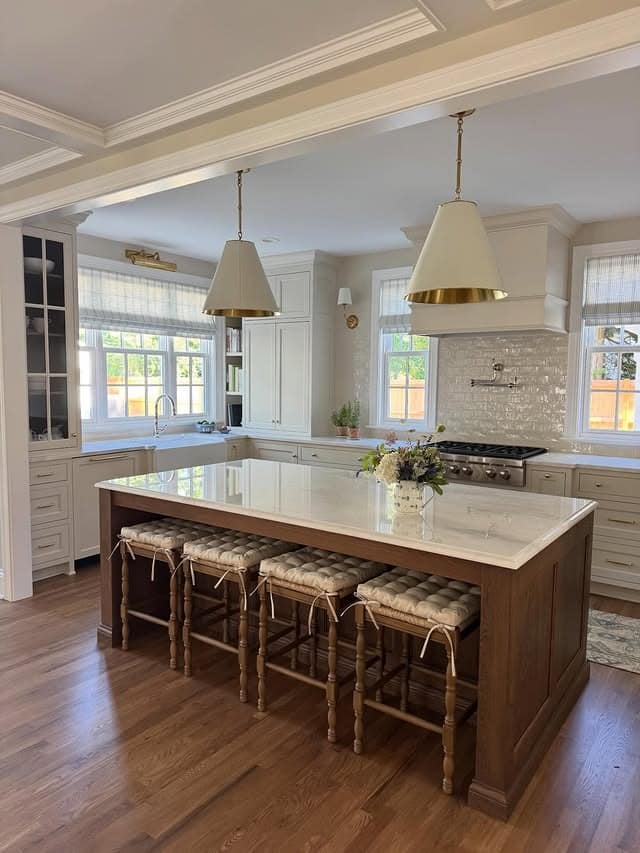 17. Medium Walnut Kitchen Island with Ivory White Cabinets - kitchen color ideas with white cabinets