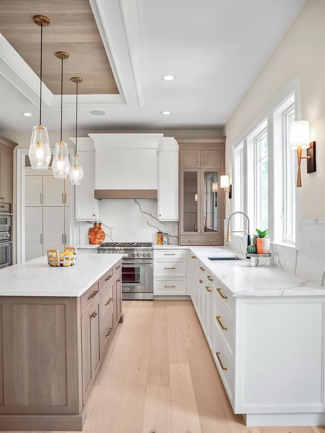 20. Warm Taupe Kitchen Island with White Cabinets and Gold Hardware - kitchen color ideas with white cabinets