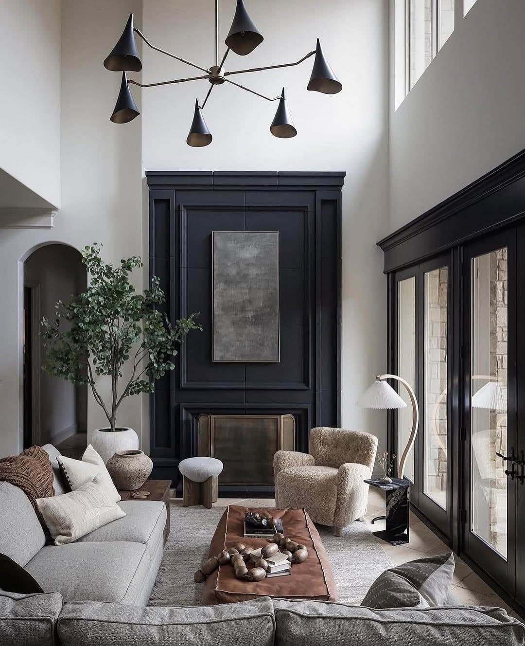 3. Elegant Gray and Brown Living Room with Black Fireplace - gray and brown living room ideas