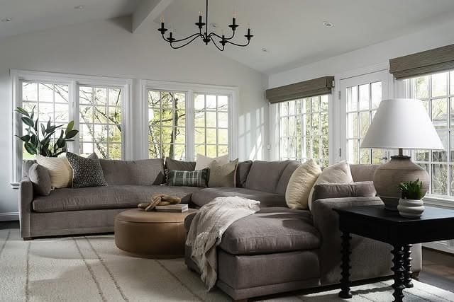 6. Bright Gray and Brown Living Room with Oversized Sectional - gray and brown living room ideas