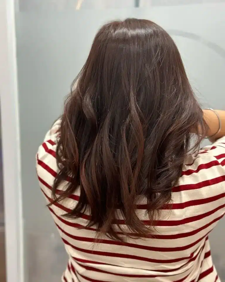 9. Natural Brown Mahogany Hair with Soft Flowing Layers - Mahogany Hair Color
