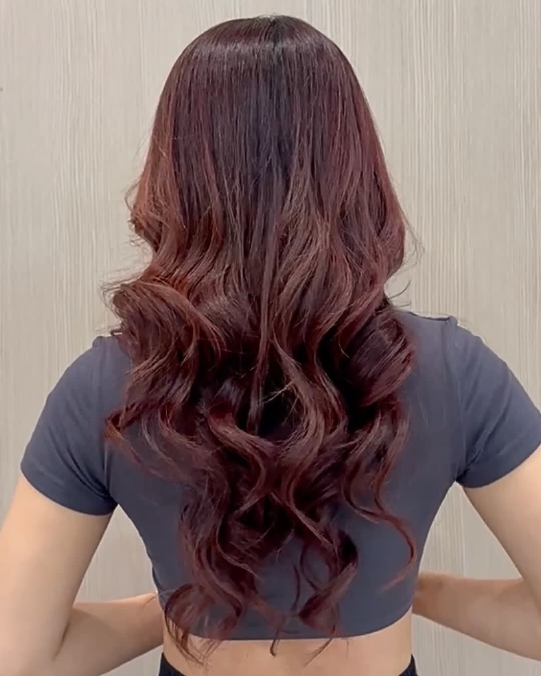 18. Glossy Red Mahogany Hair with Long Cascading Curls - Mahogany Hair Color
