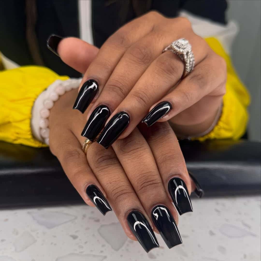4. Long Glossy Black Coffin Acrylic Nails - black coffin nail ideas