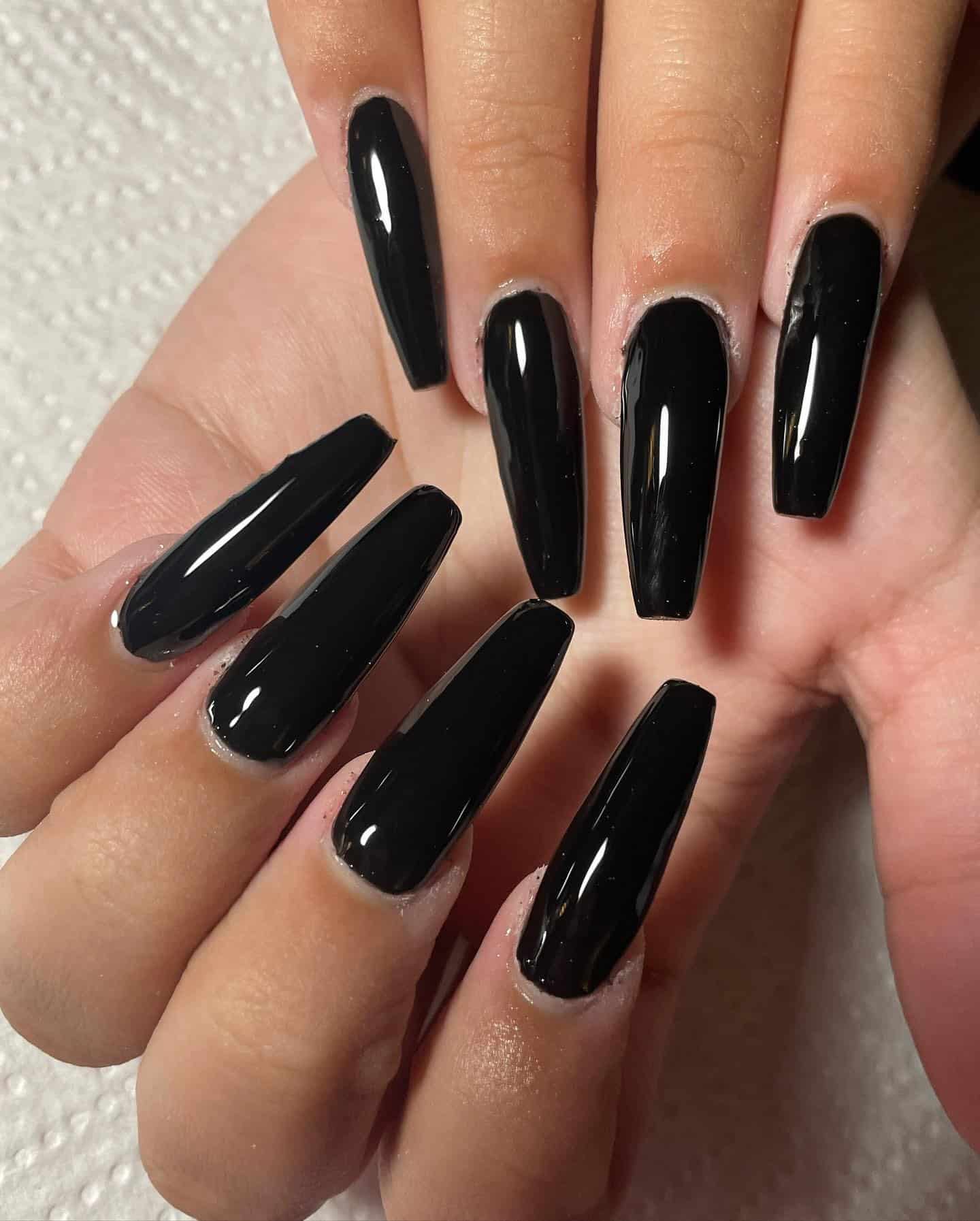 21. Extra Long Jet Black Coffin Nails with High-Gloss Finish - black coffin nail ideas