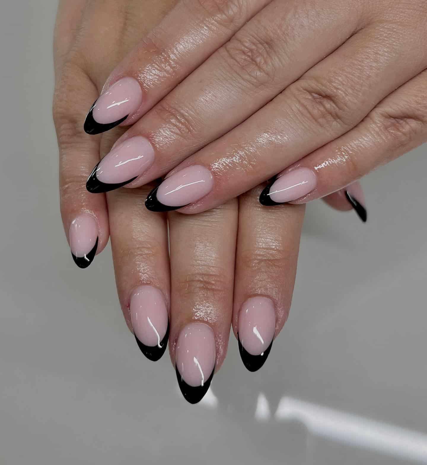 9. Soft Pink Almond Nails with Thin Black French Tips - black french nail ideas