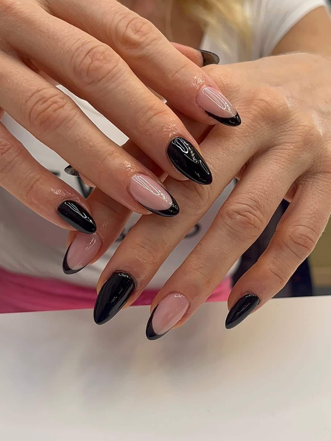 11. Glossy Black and Nude Pink French Almond Nails - black french nail ideas