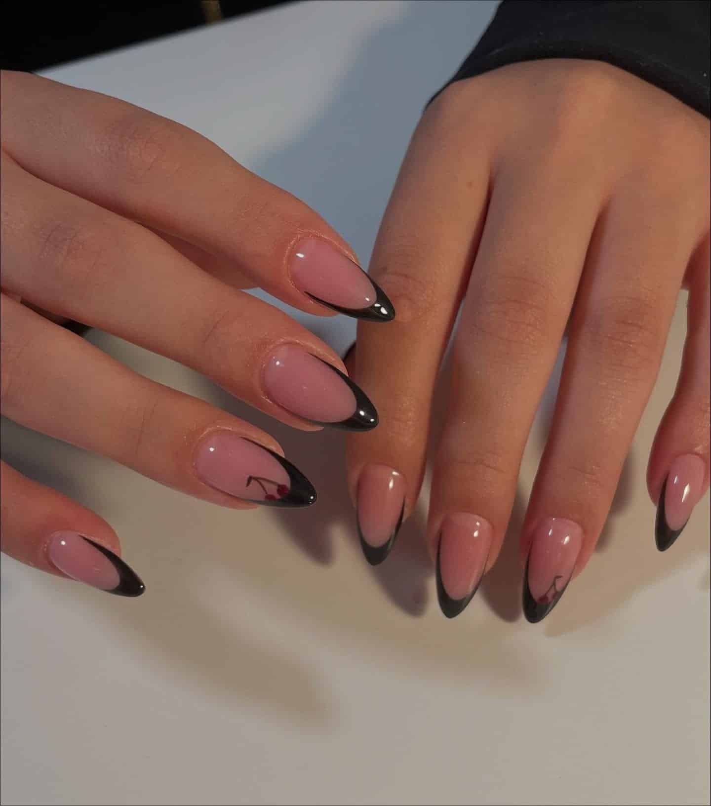 13. Black French Almond Nails with Dark Red Cherry Accents - black french nail ideas