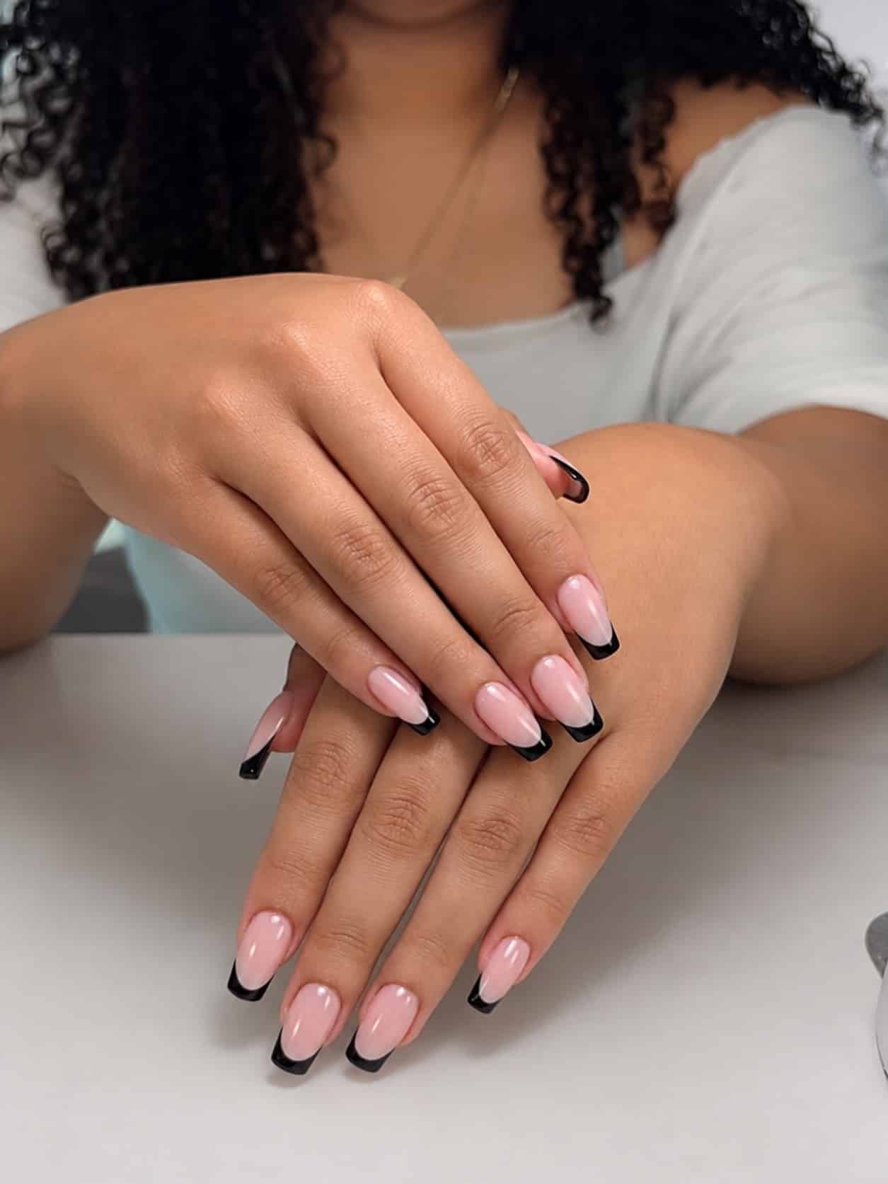 14. Thin Black French Tips on Milky Pink Square Nails - black french nail ideas