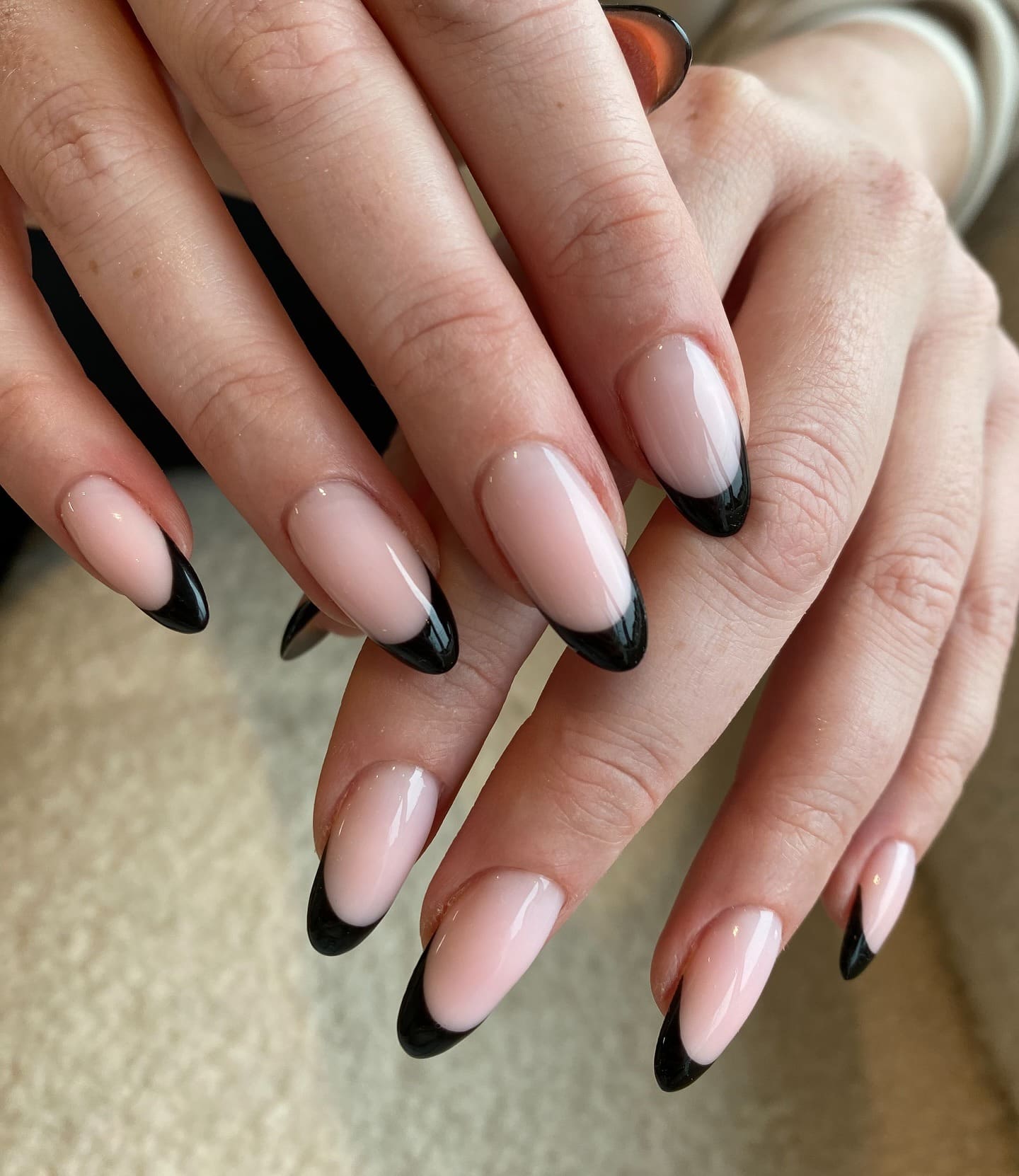18. Classic Black French Almond Nails with Milky Nude Base - black french nail ideas