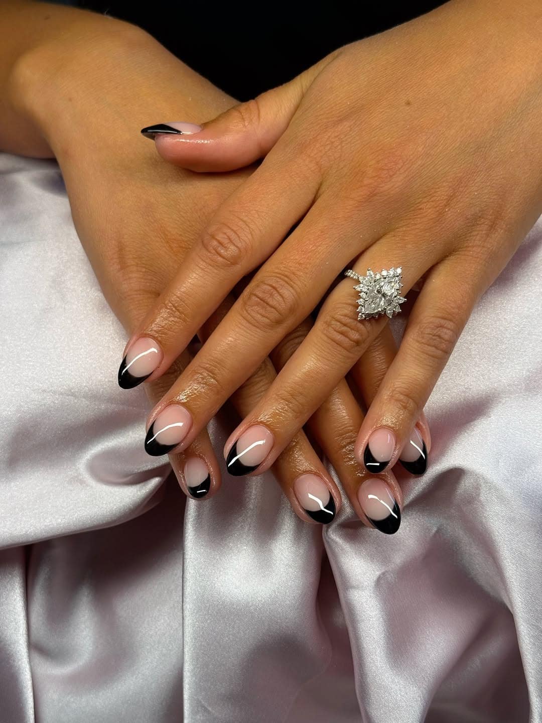 20. Elegant Black French Almond Nails with Sheer Blush Pink Base - black french nail ideas