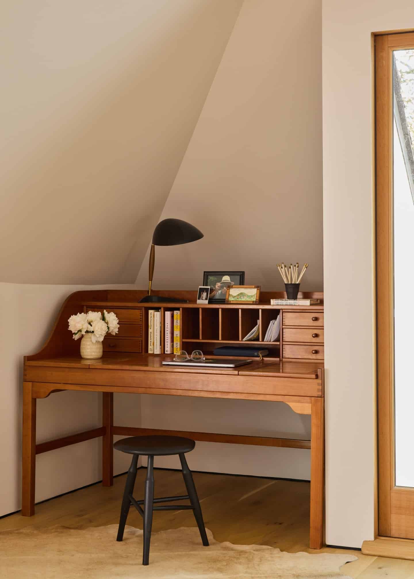 5. Classic Warm Brown Wooden Attic Office with Cream Walls - attic office ideas