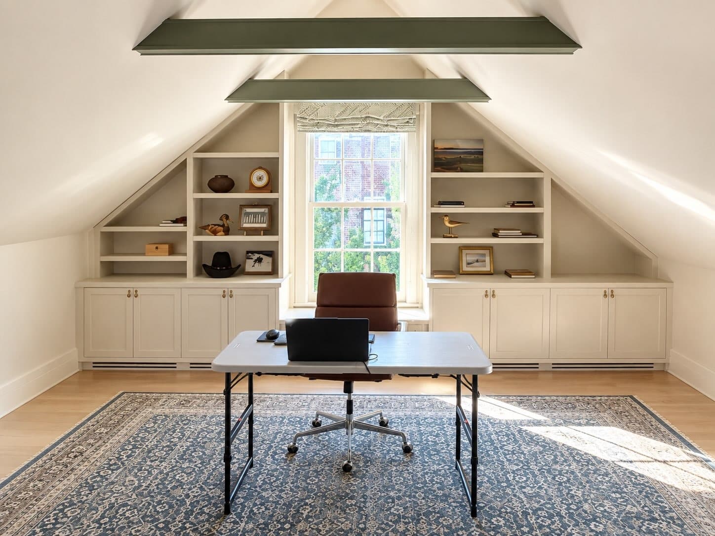 21. Classic Cream and Sage Green Attic Office with Built-In Bookshelves - attic office ideas
