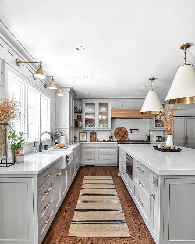 6. Timeless Pale Grey Kitchen Cabinets with Brass Hardware - grey cabinet kitchen ideas