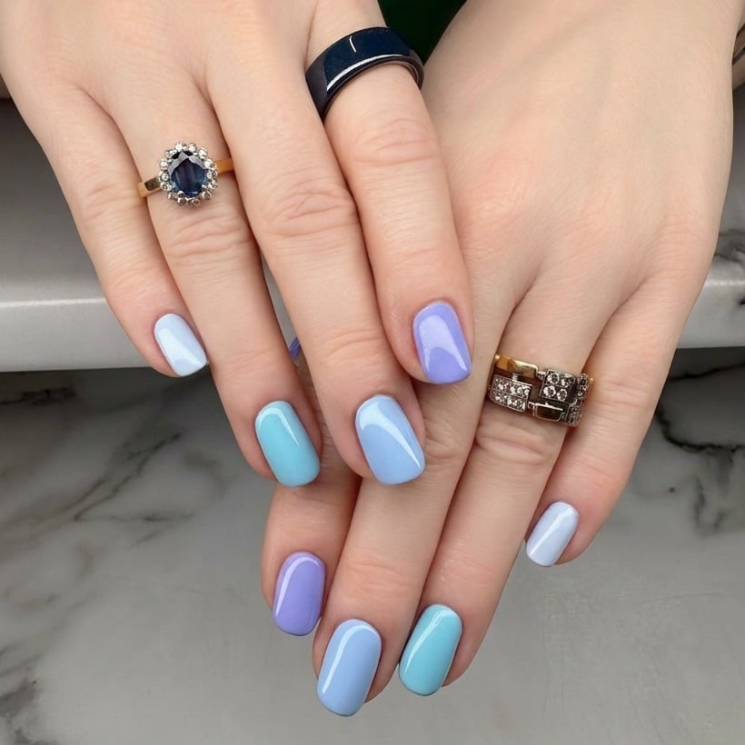 2. Pastel Blue and Lavender Skittle Nails - blue and purple nail ideas