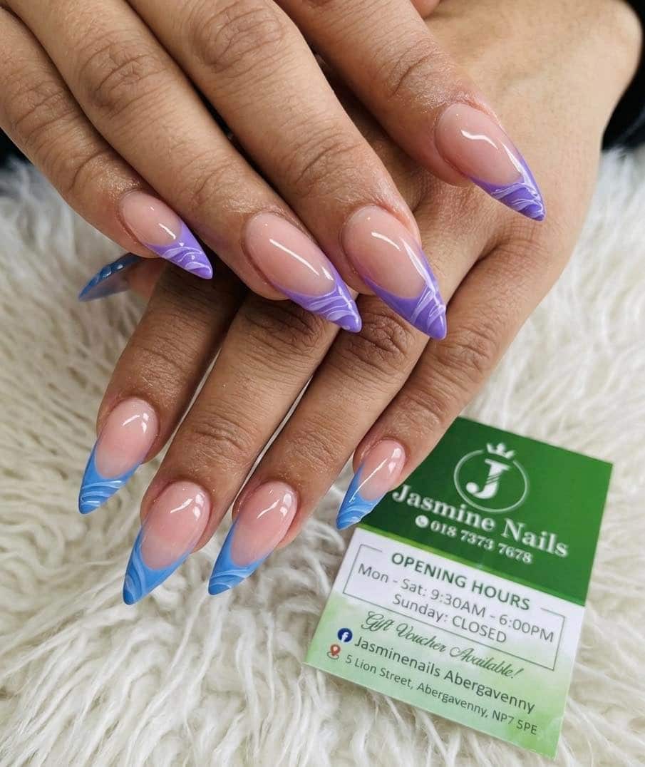 7. Lavender Purple and Baby Blue Swirl Stiletto Nails - blue and purple nail ideas