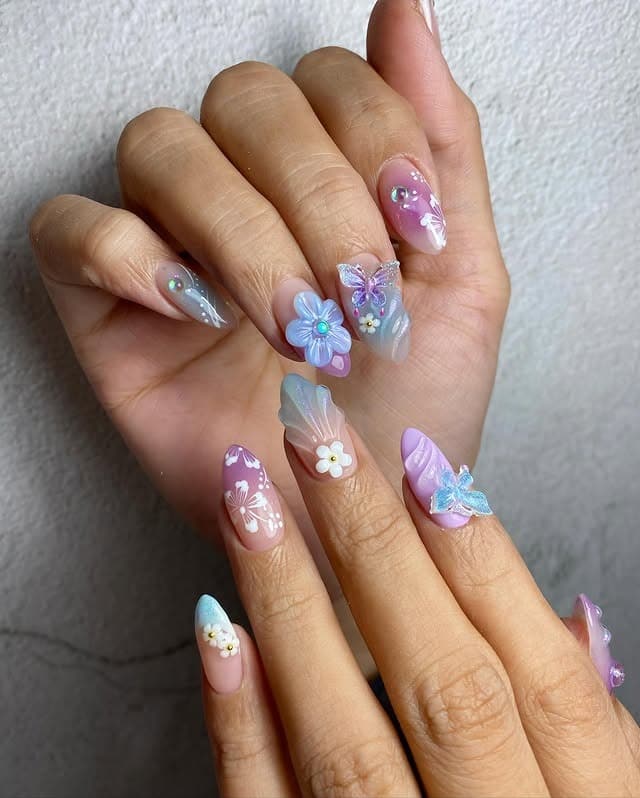 15. Pastel Blue and Lilac 3D Butterfly Floral Nails - blue and purple nail ideas