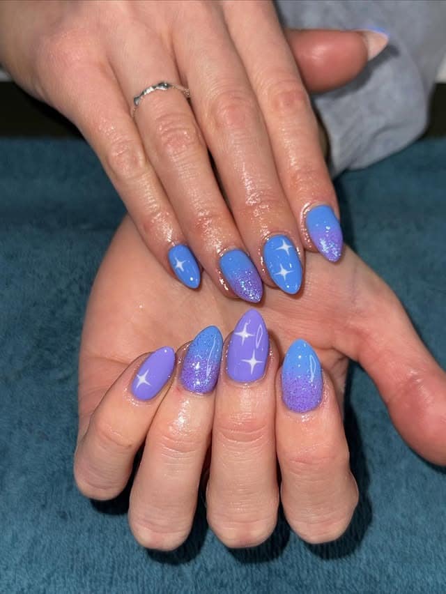 17. Periwinkle Blue and Lavender Glitter Star Nails - blue and purple nail ideas