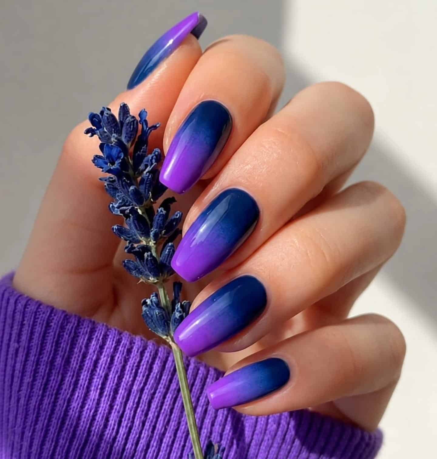 19. Navy Blue and Violet Purple Ombre Coffin Nails - blue and purple nail ideas
