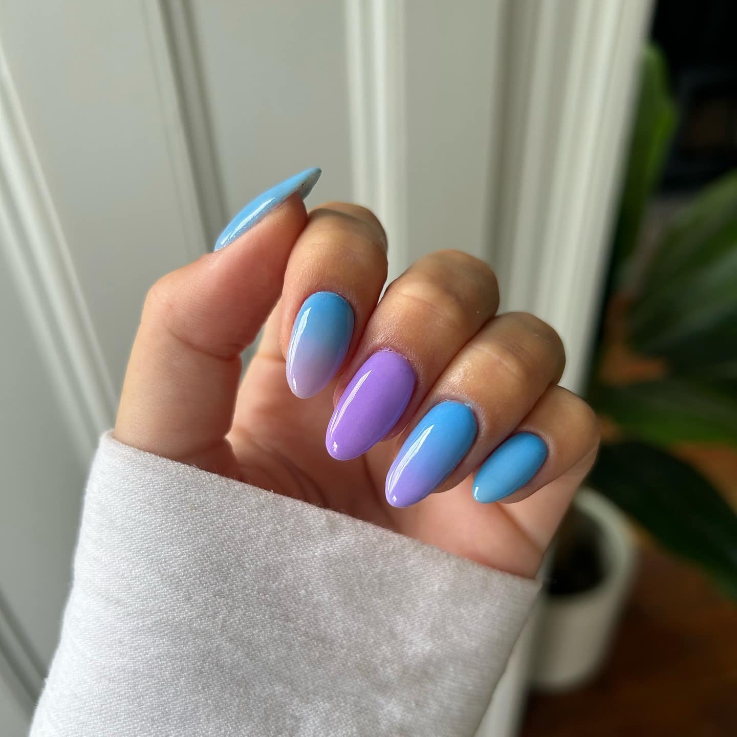 20. Sky Blue and Lavender Purple Ombre Almond Nails - blue and purple nail ideas