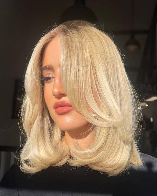 1. Platinum Blonde Layered Lob with Curtain Bangs - Lob Hairstyles