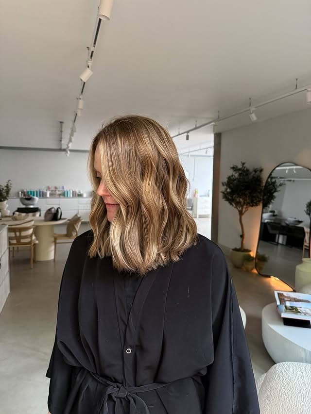 4. Honey Blonde Wavy Lob with Face-Framing Highlights - Lob Hairstyles