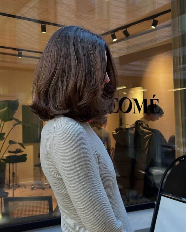 5. Espresso Brown Voluminous Lob with Flipped Ends - Lob Hairstyles