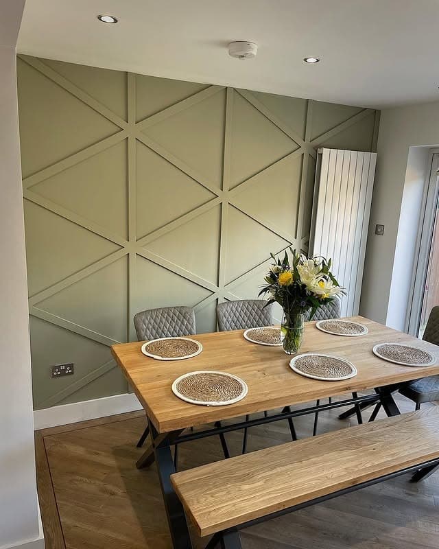 6. Muted Sage Green Geometric Kitchen Feature Wall with Oak Dining Furniture - feature wall kitchen ideas