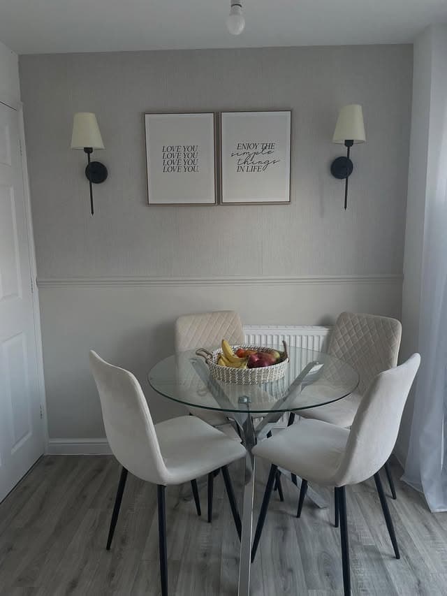 10. Light Gray Textured Kitchen Dining Feature Wall with White Wainscoting - feature wall kitchen ideas