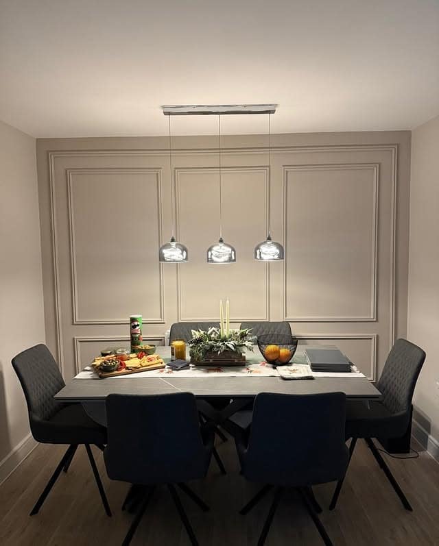 13. Classic Taupe Paneled Kitchen Dining Feature Wall with Charcoal Furniture - feature wall kitchen ideas