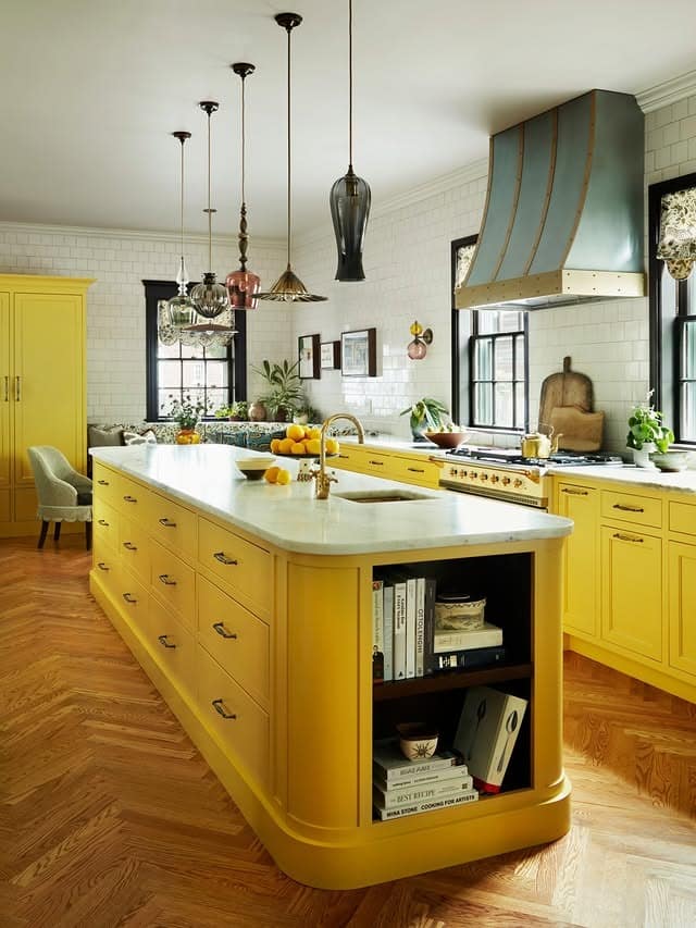 2. Sunny Yellow Kitchen with a Statement Island - bright kitchen ideas