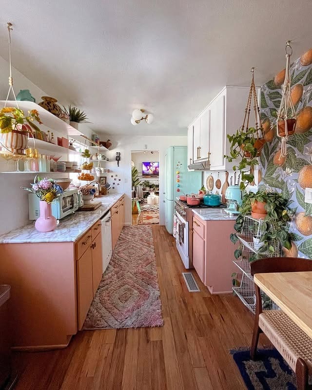 14. Pastel Pink Kitchen with Botanical Wallpaper - bright kitchen ideas