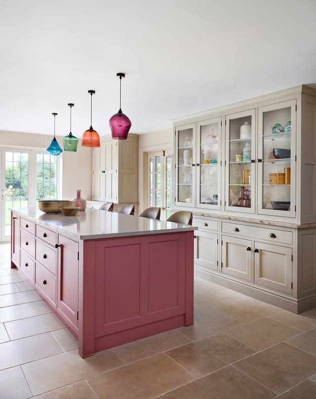 16. Blush Pink Kitchen Island with Colorful Glass Pendants - bright kitchen ideas
