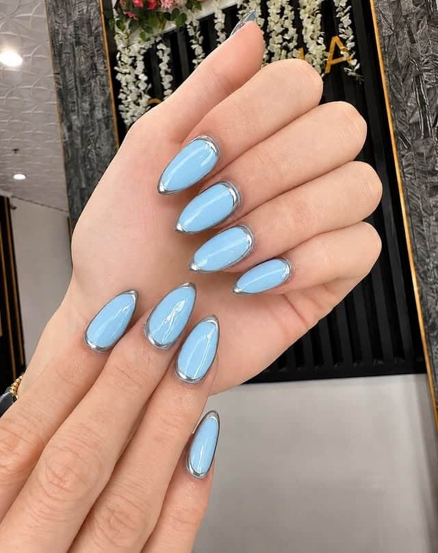 4. Pastel Blue Nails with Silver Chrome Outlines - blue and silver nail ideas