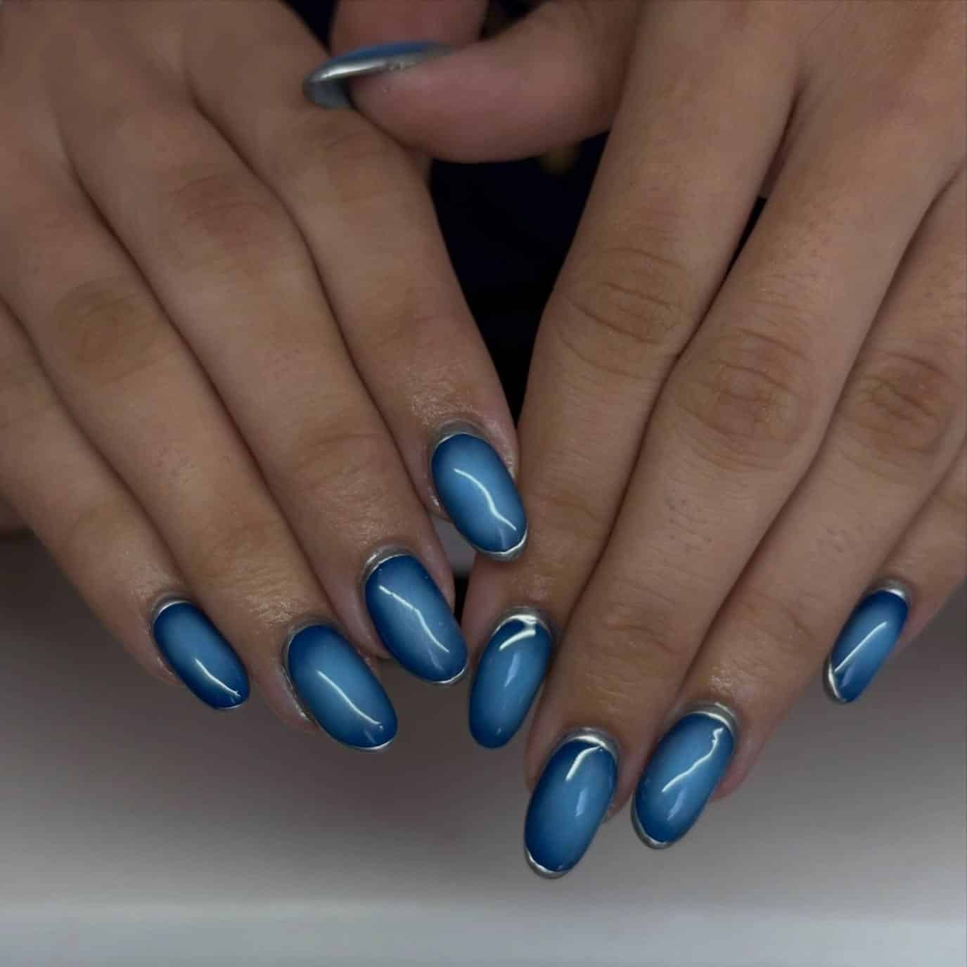 15. Ocean Blue Ombre Nails with Silver Chrome Borders - blue and silver nail ideas