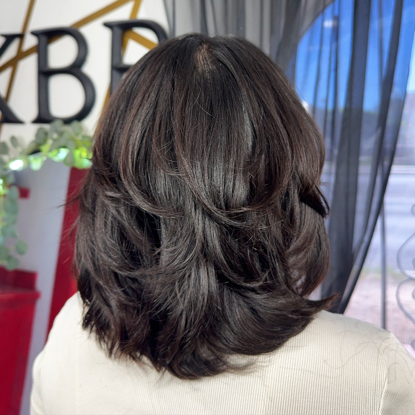 4. Dark Chocolate Butterfly Bob with Feathered Ends - Short Layered Haircuts